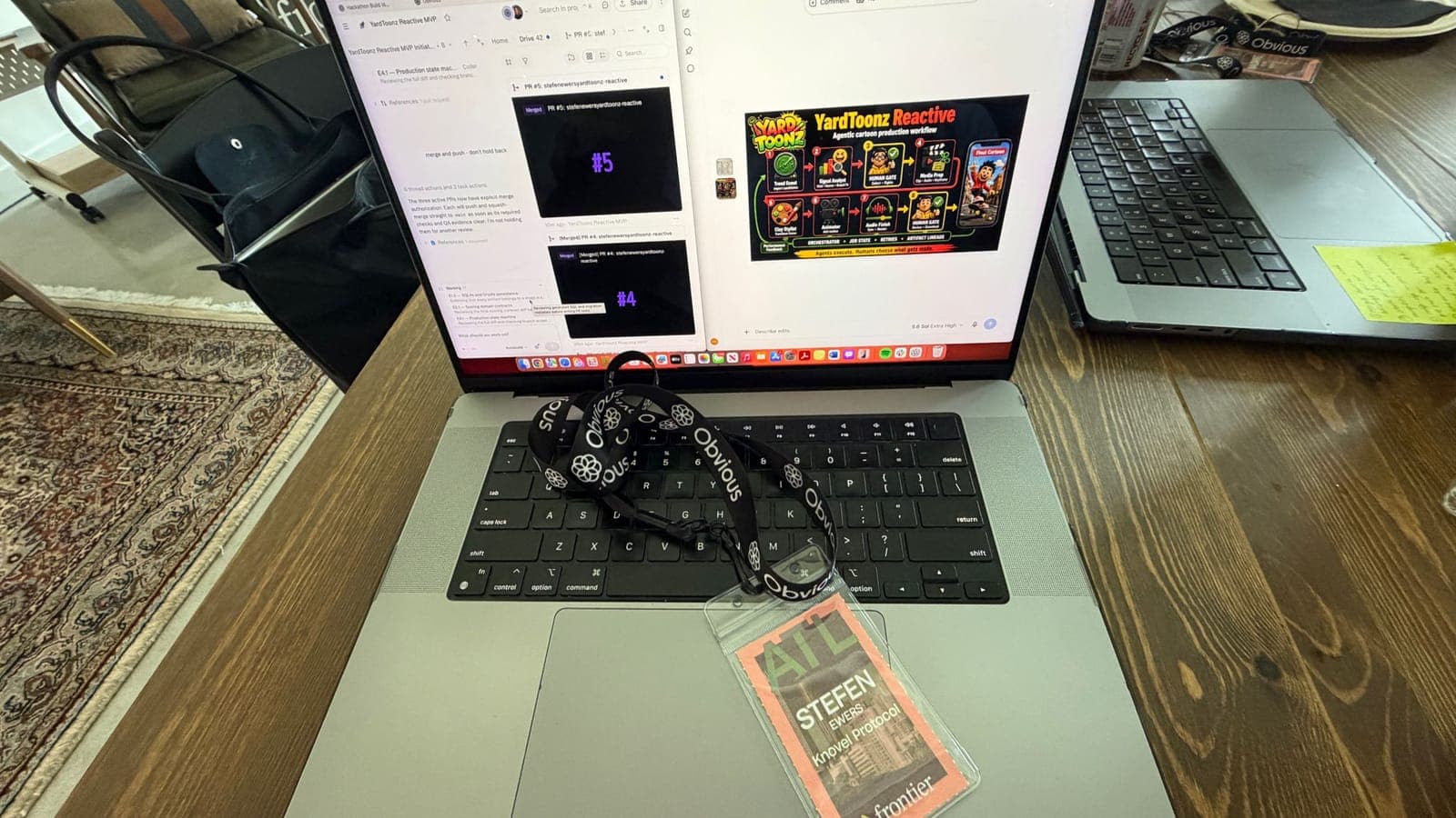 A laptop at the Frontier build showing the YardToonz Reactive pipeline, with Stefen’s Frontier Atlanta badge and Obvious lanyard resting on the keyboard.